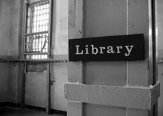 A library sign at a correctional facility.